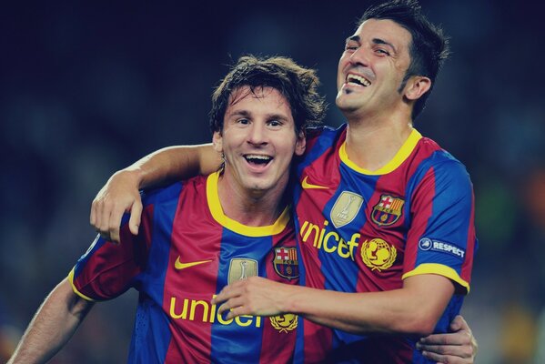 This photo shows David Villa and his best friend Messi, FC Barcelona uniform