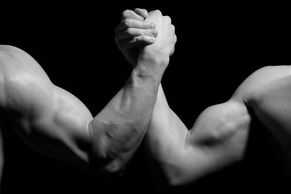 Illustration of arm wrestling in black shades