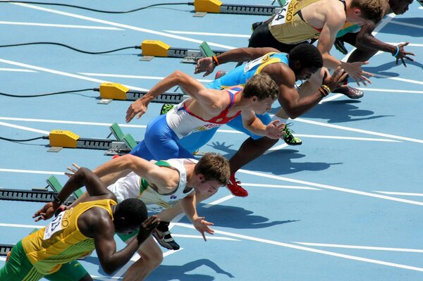 Athletes running to victory