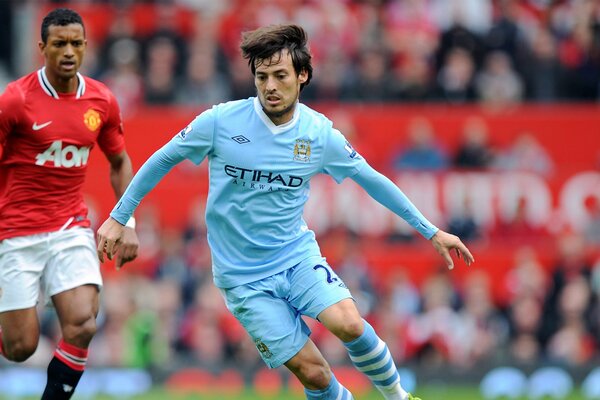 Footballer David Silva at the match