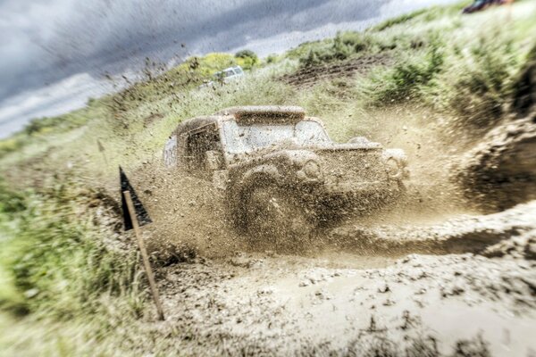 Sports car racing in the mud