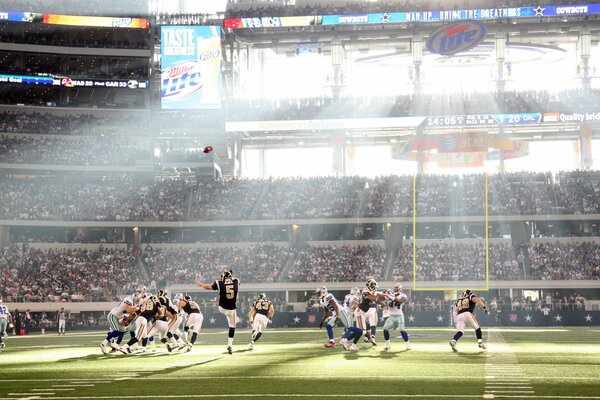 Football field in the rays of light