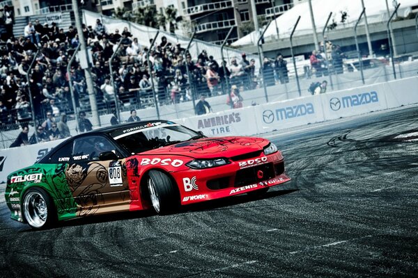 Skidding of a Nissan car at a competition