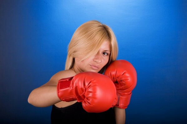 Girl in red boxing gloves