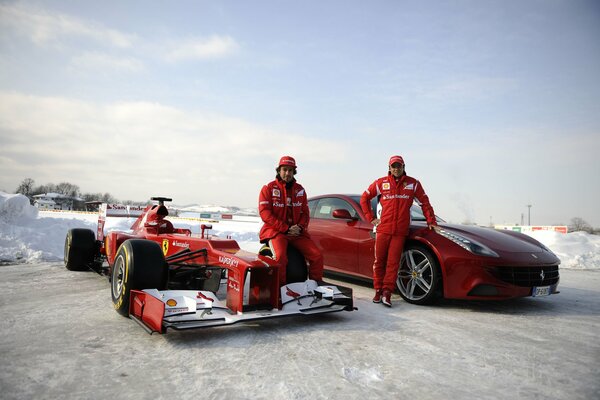 Ferrari racing cars with drivers