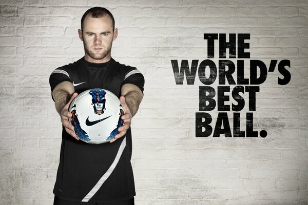 La pelota en manos de Wayne Rooney