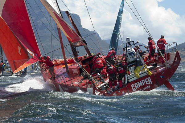 People on a yacht are sailing in the ocean