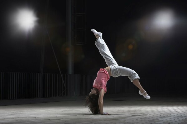 Flexible girl in a sports dance