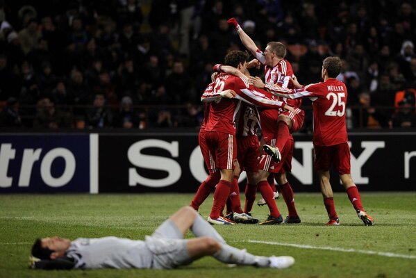 The players are happy to score a goal