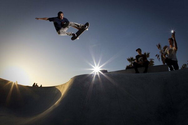 Skateboard jump surrounded by spectators