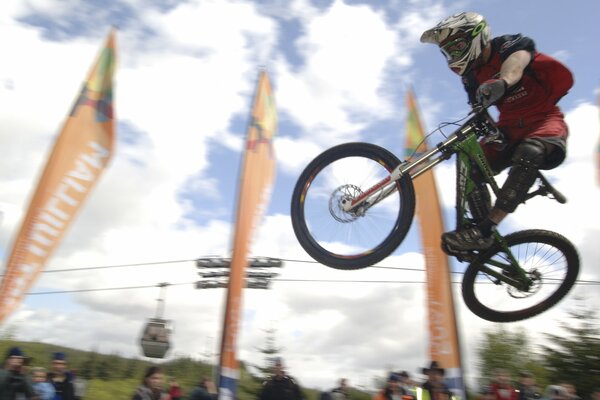 The jump of a motorcyclist on the track is large