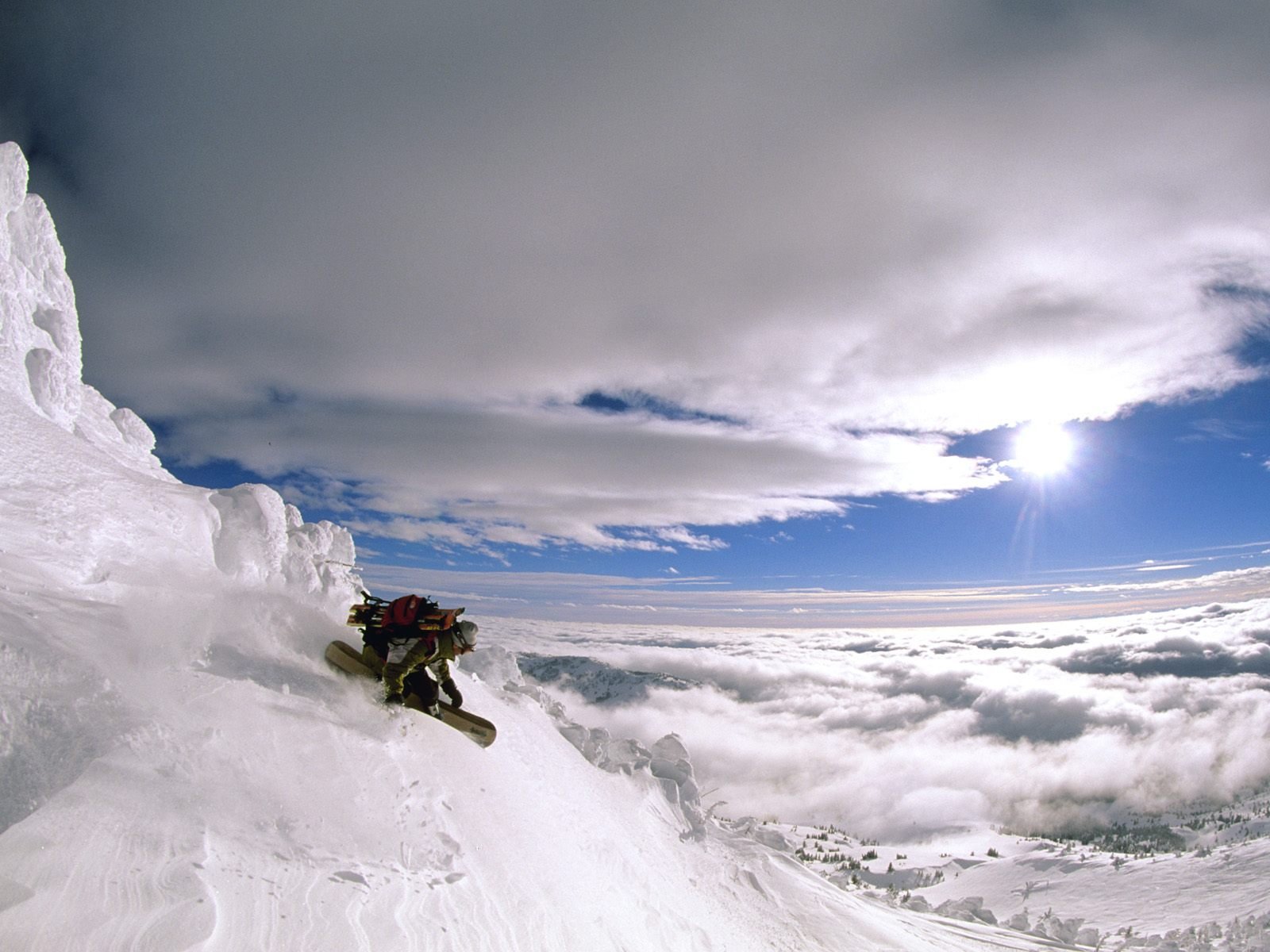 snowboard góry śnieg słońce chmury