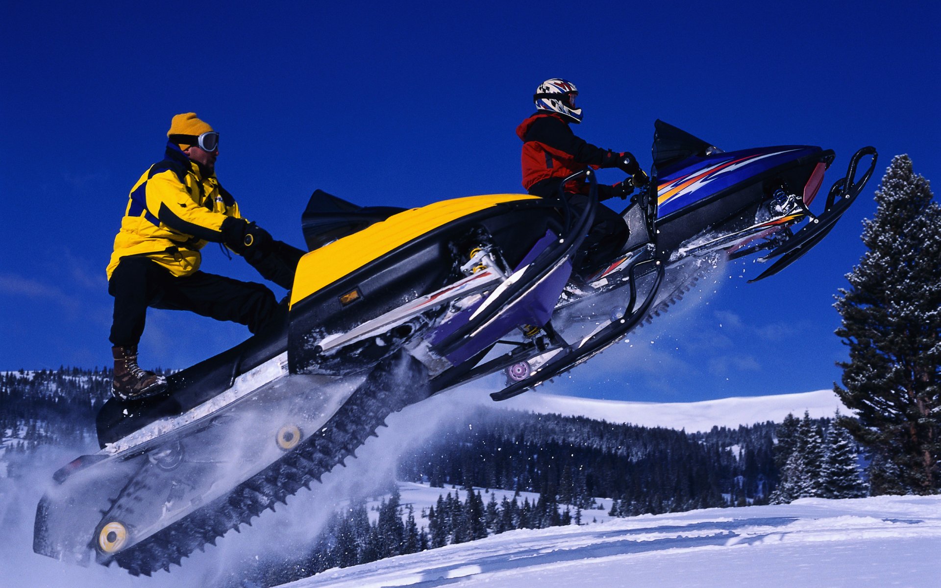 invierno motos de nieve salto cielo