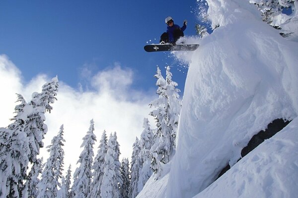 Snowboarding on the background of a winter landscape