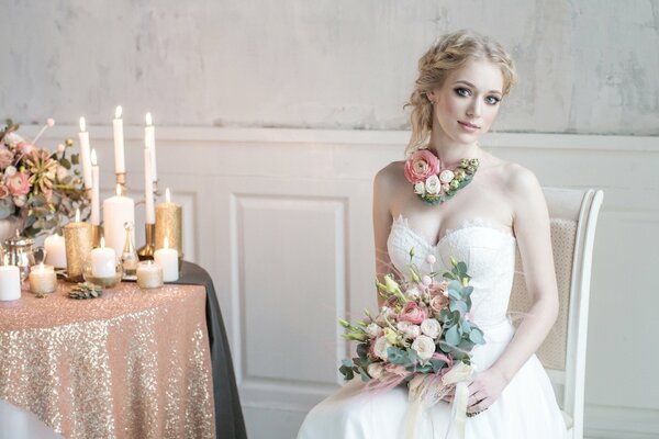 Beautiful girl in a dress with a bouquet