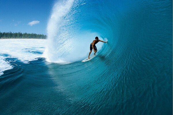 Conquering the waves by surfers