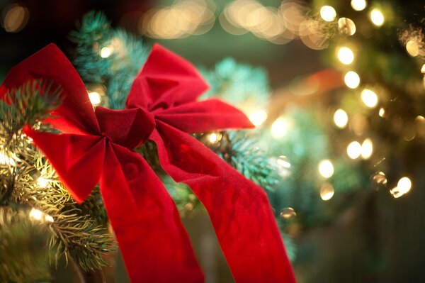 New Year s bow on a decorated Christmas tree