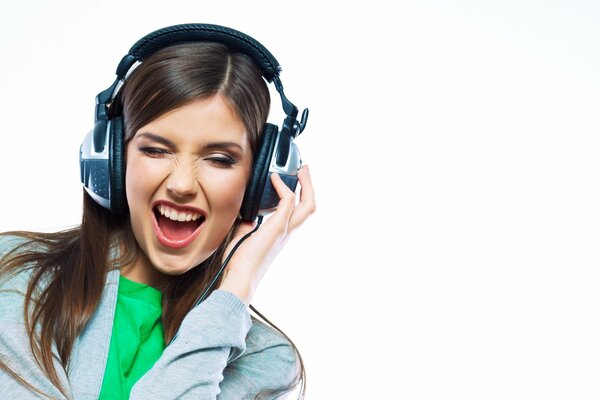 Any girl is delighted with high-quality sounding music from headphones