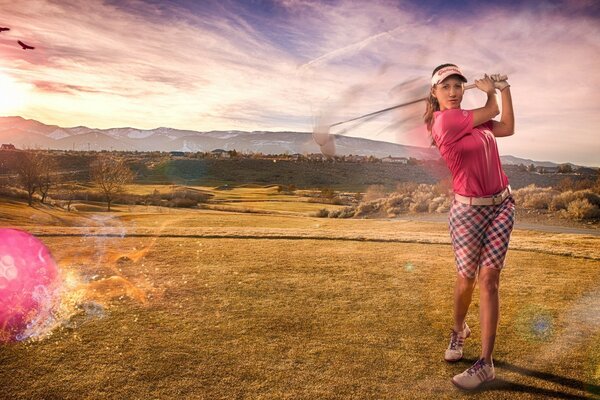 Fille jouant au golf dans la nature