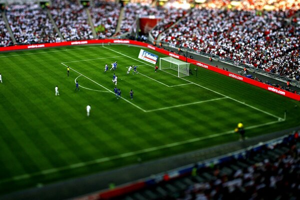 Football players at the stadium, lead the ball to the goal