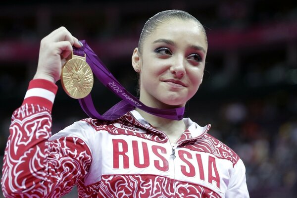 Gymnast Aliya Mustafina with a medal