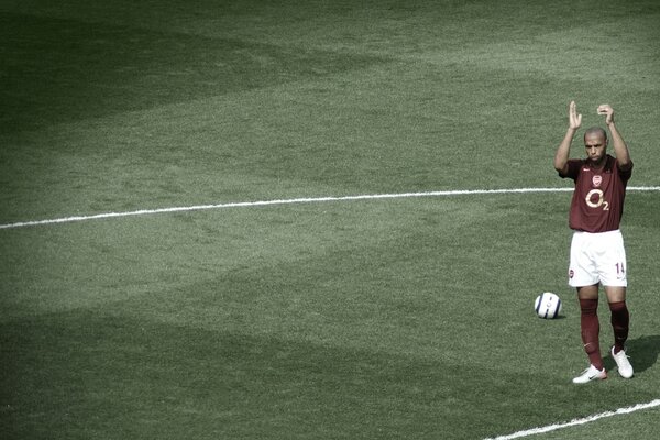 Arsenal football player on the field