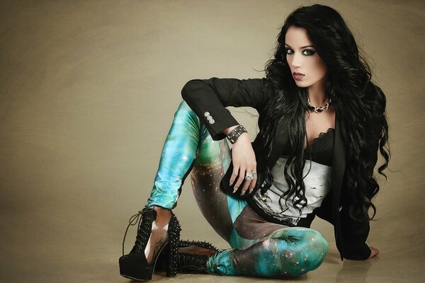 Brunette in heels and bright leggings