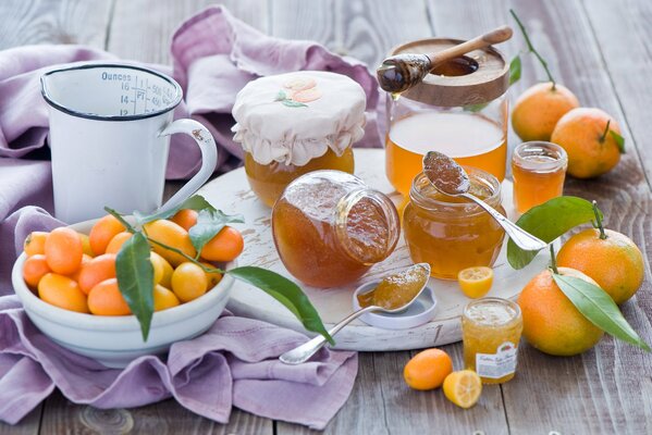 Jars of kumquat jam on the table