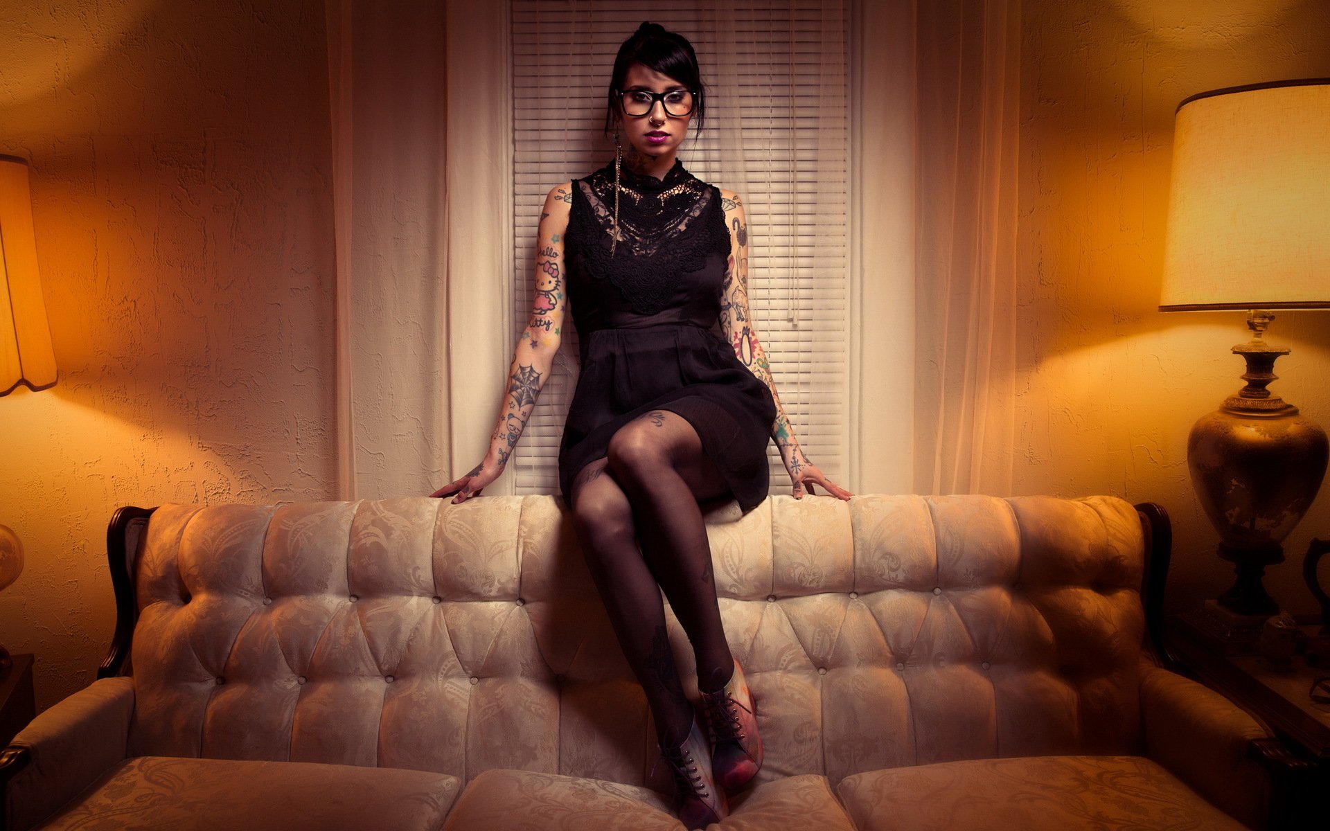 girl tattoos sofa