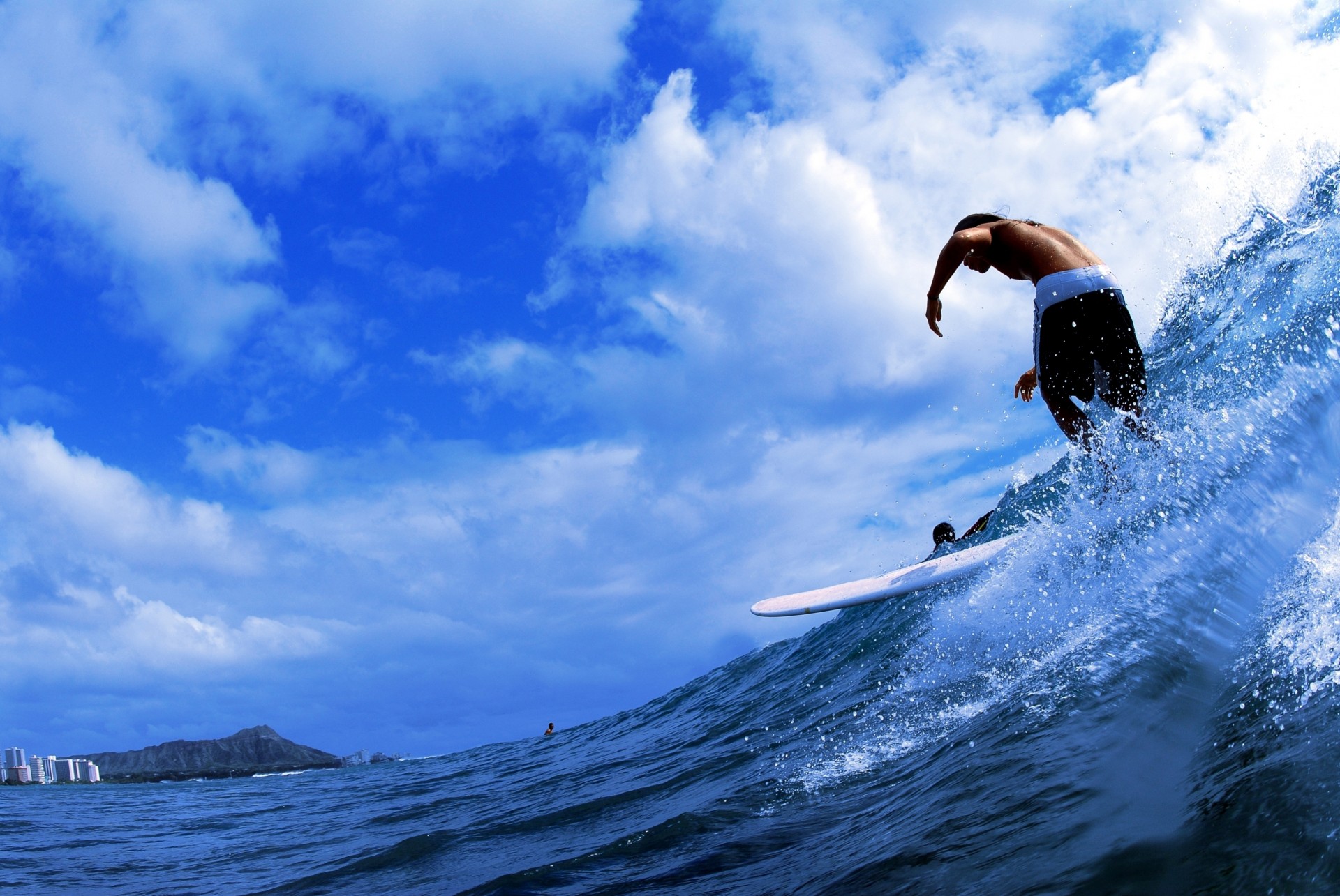 clouds balloon wave sea man surfing