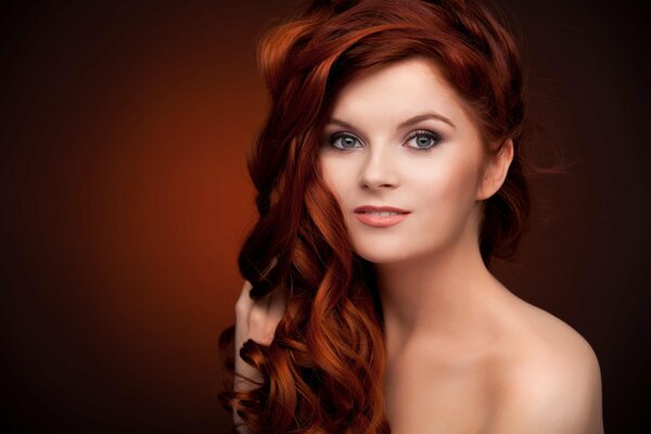 Fiery red-haired girl with makeup