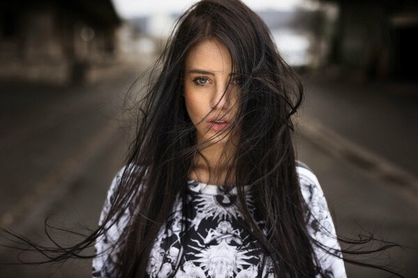 Brunette girl with wind-blown hair