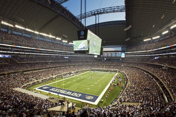 A huge football field with fans