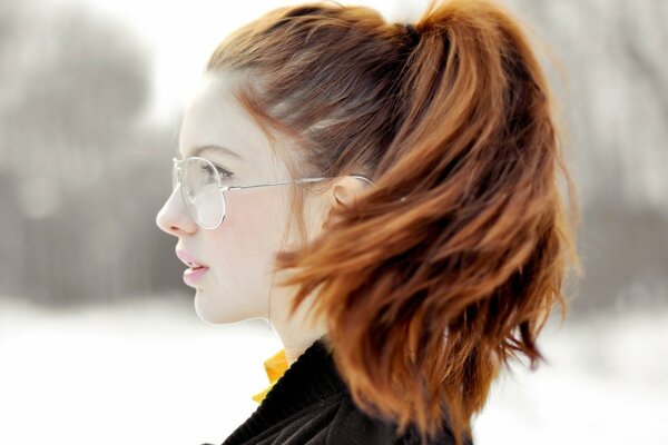 Red-haired girl in profile