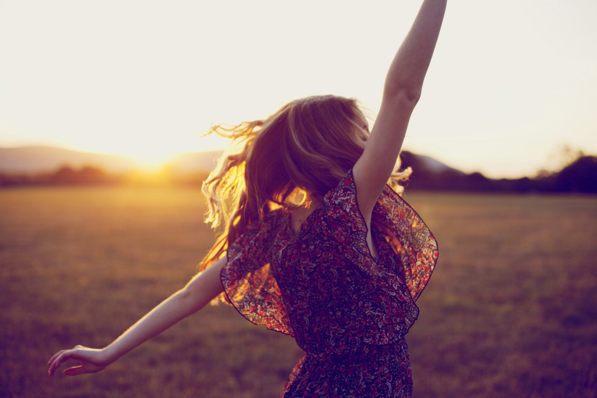 girl happy girls in nature blonde nature outdoors hair long hair sun joy mountains field grass pose sunset blonde hair mountain represent