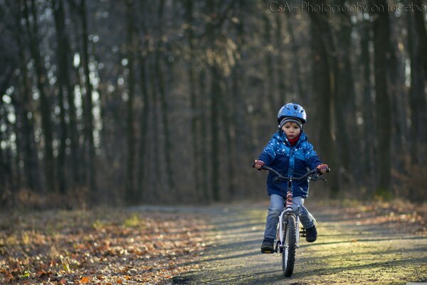 Cute kid riding a bike