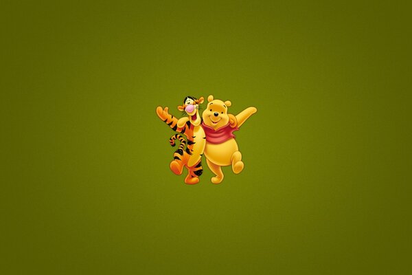 Winnie the Pooh and tiger in an embrace on a dark green background