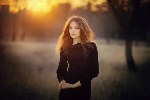 Cute redhead girl in the woods