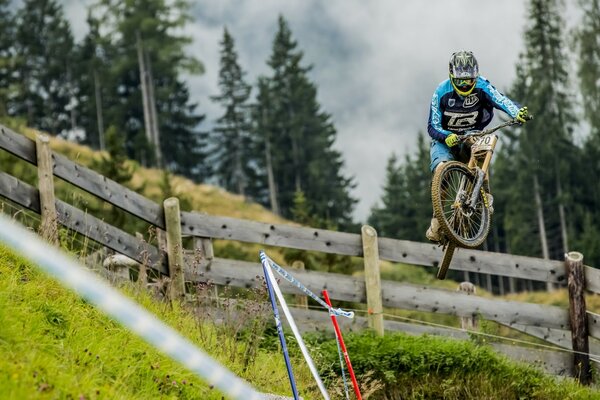 Bike racing over the fence