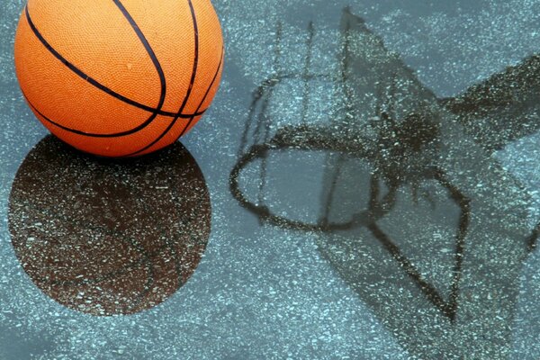 A basketball in the reflection