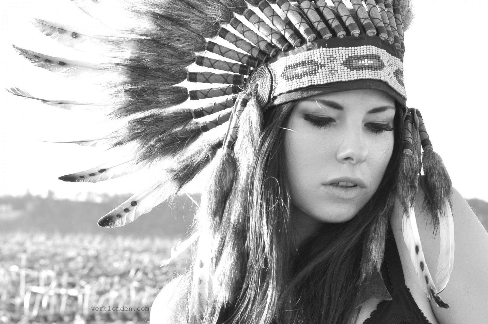 girl face headwear feathers black and white