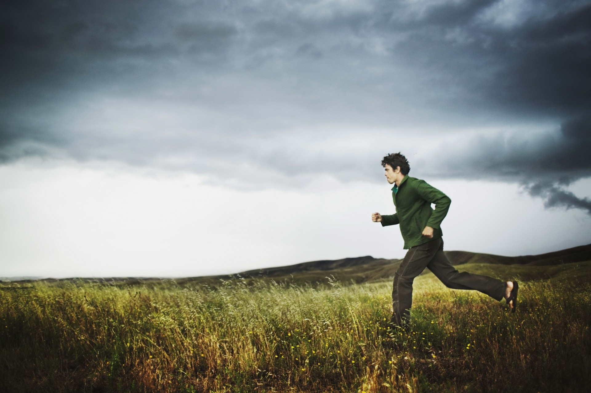 clouds man running the storm the field sport