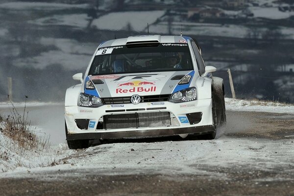 Sports Volkswagen Polo on a snowy road