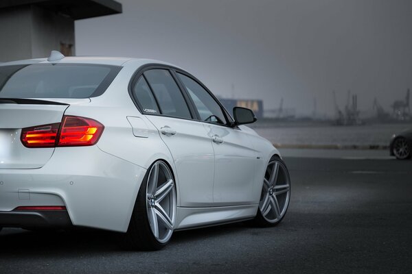 Bmw leaves in the night fog