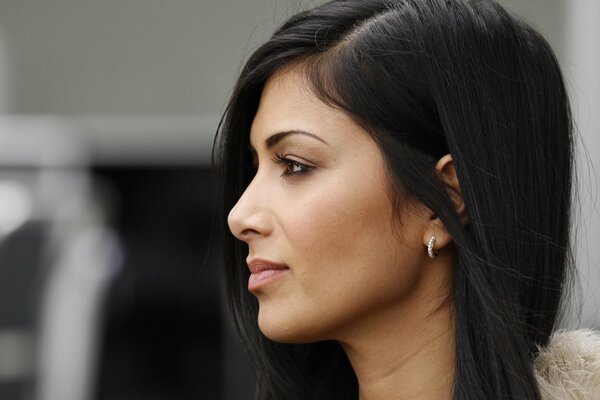 Nicole Scherzinger looks away