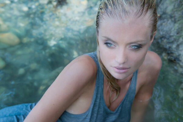 A girl in a wet T-shirt