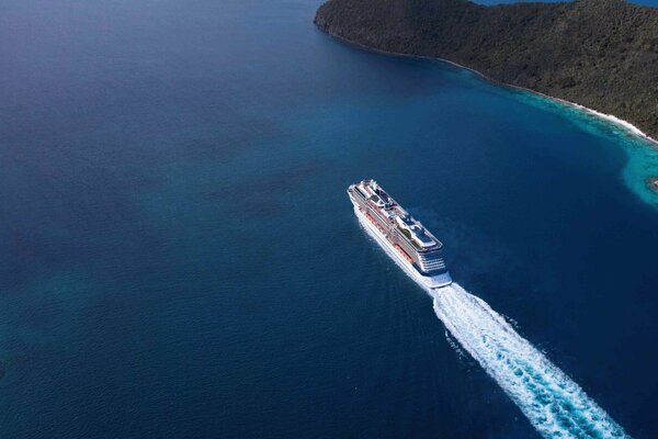 A passenger liner is sailing in the wind