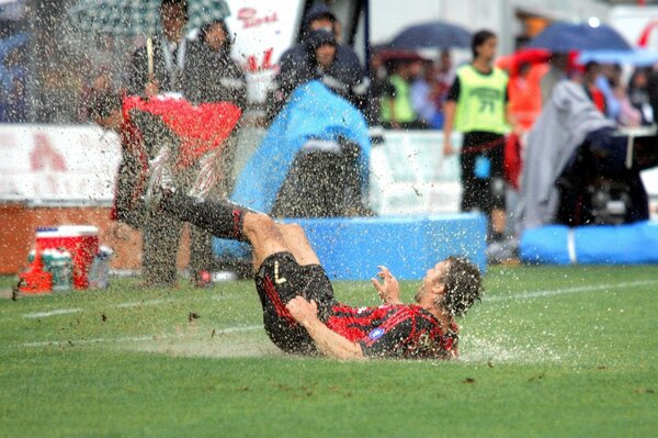 A football player in Milan slipped on the field