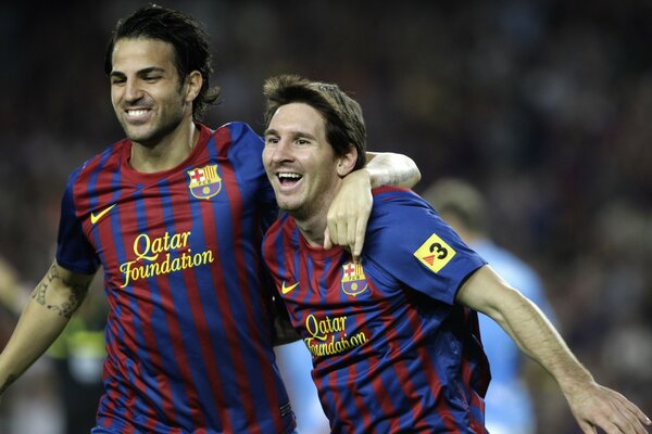 Barcelona football players in a happy rush