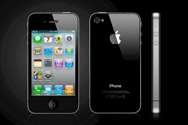 Black smart iphone on a black background